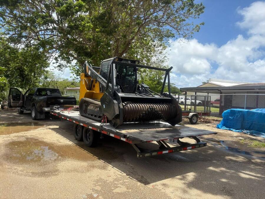 Heavy equipment loaded on Darkside trailer