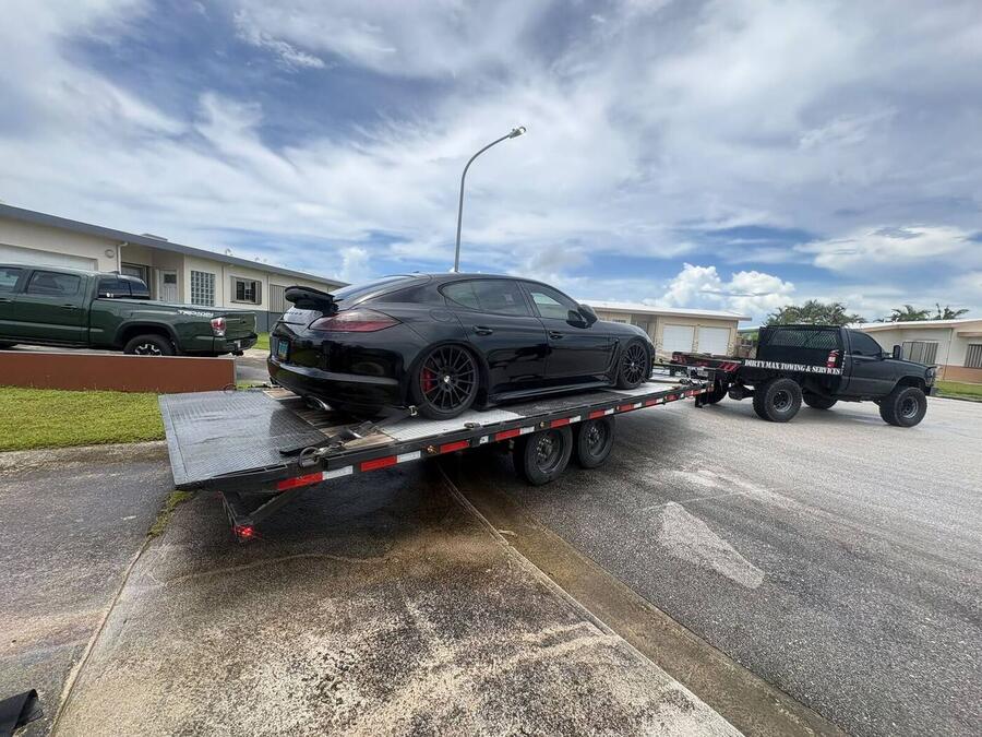 Porsche Panamera secured on Dirty~Max flatbed, Guam